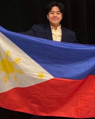 Jan Edrian Ariola with Philippines flag