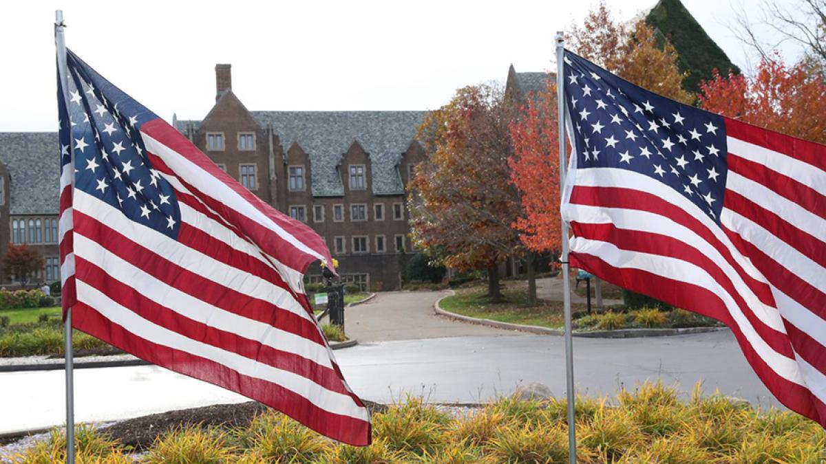 Flags in front of Old Main outside for Celebration of Valor