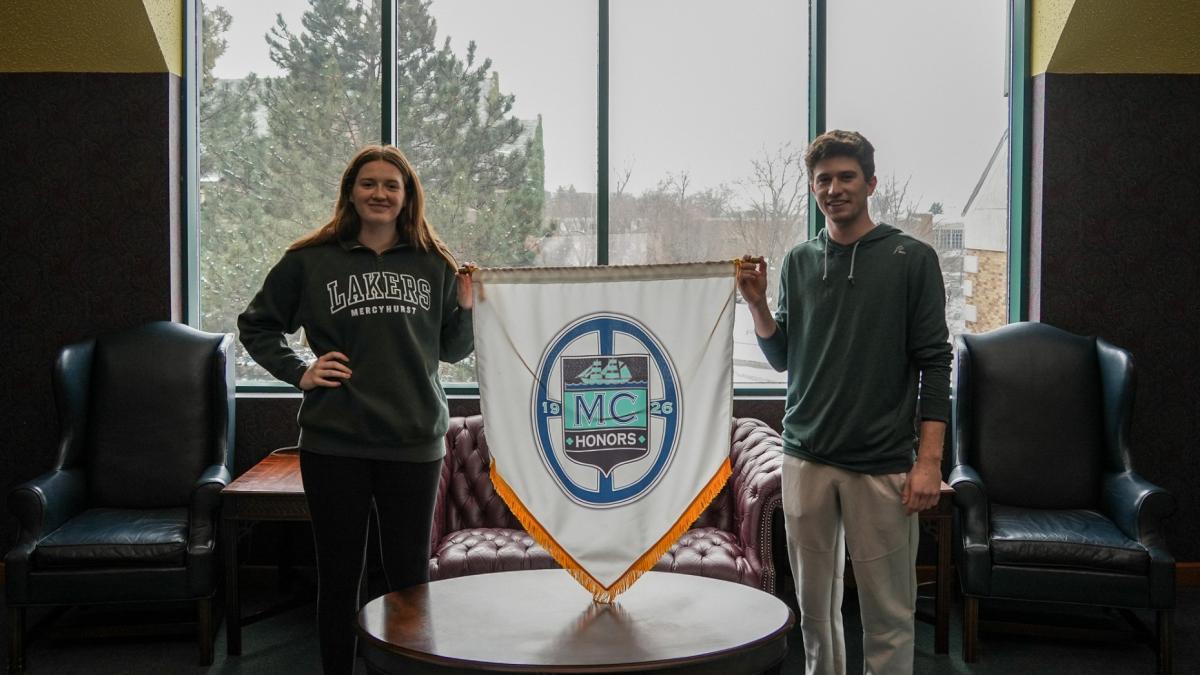 Mercyhurst honors students, holding flag