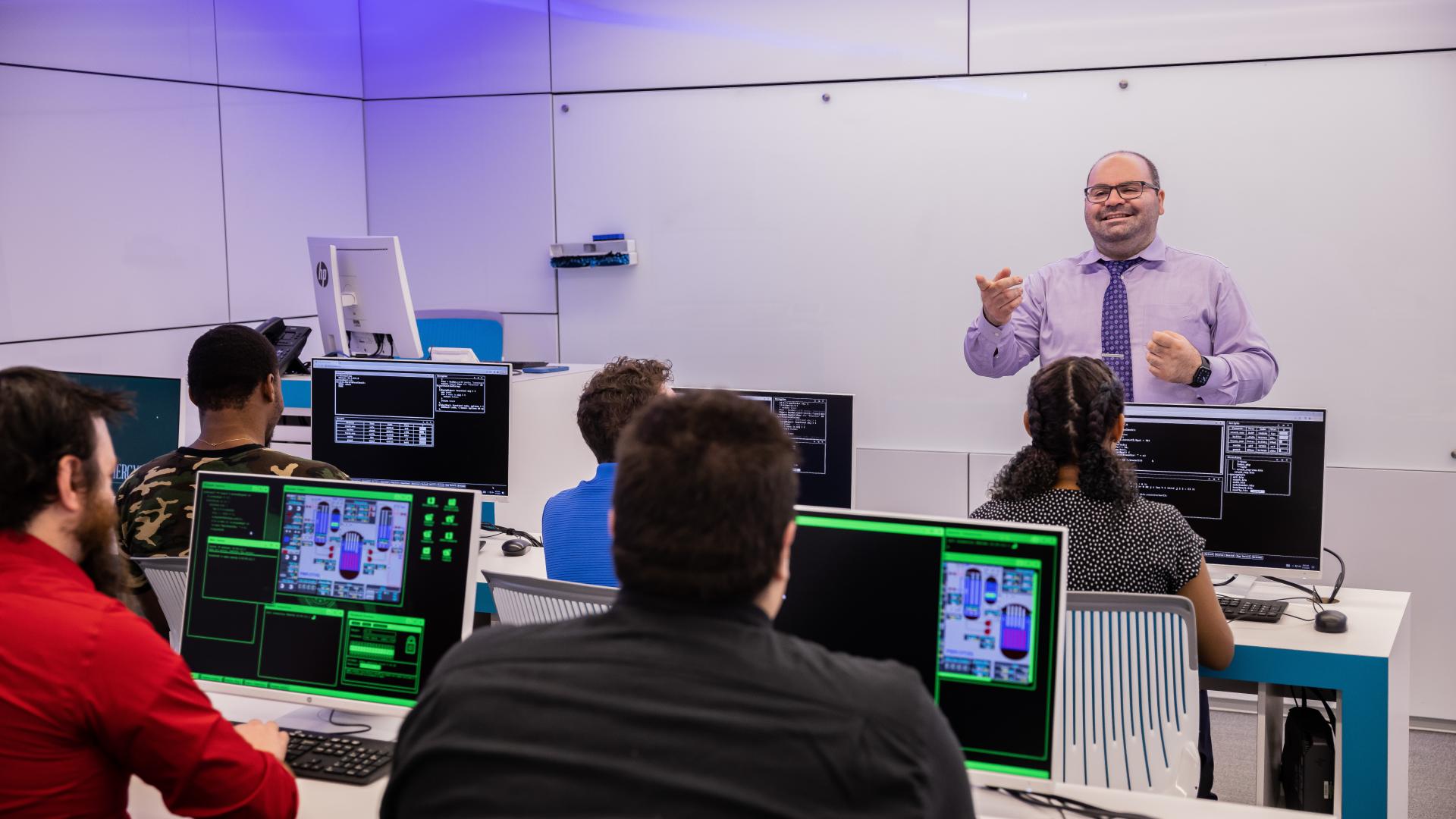 professor teaching classroom full of students