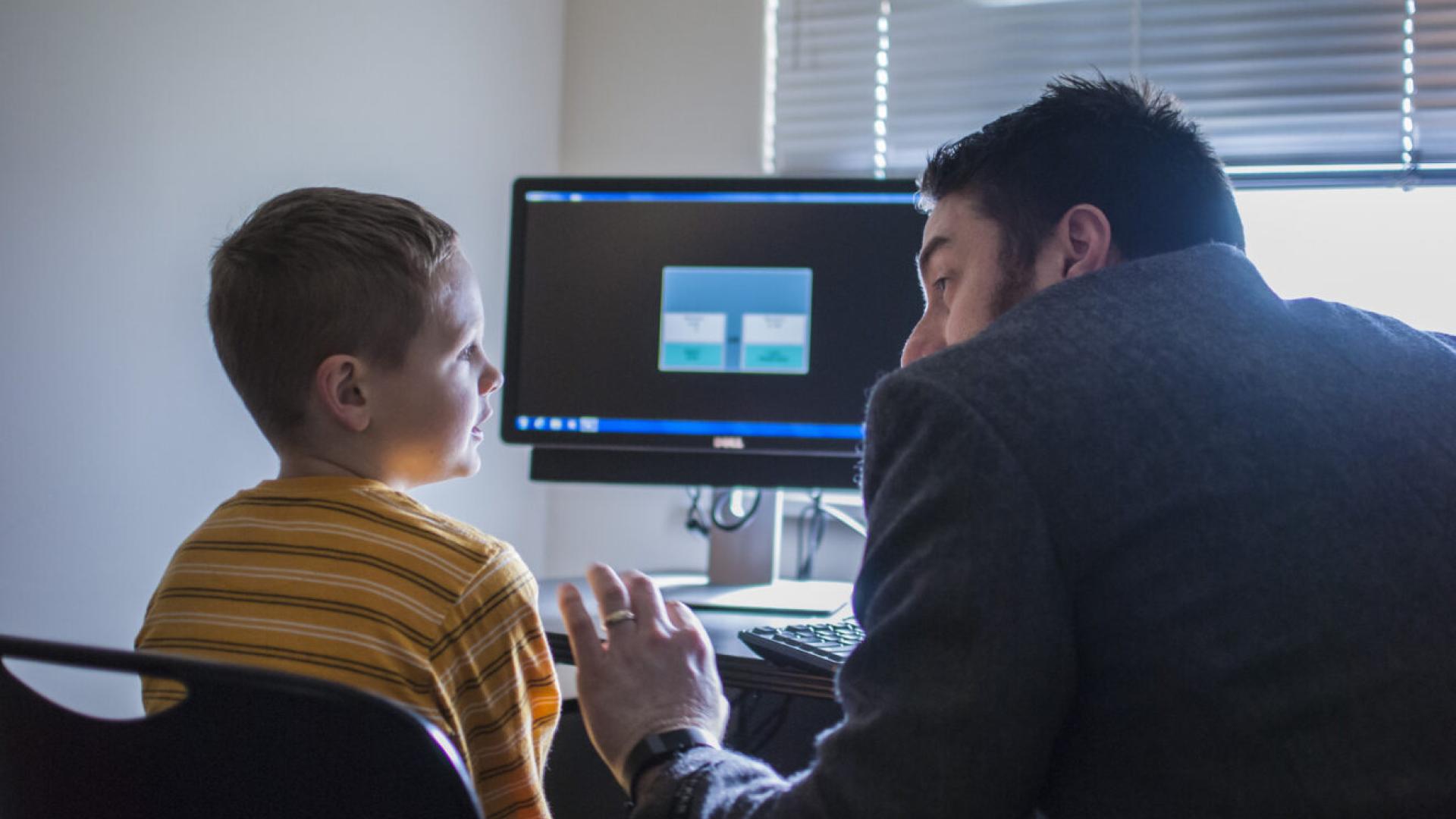 Psychology student talking to patient