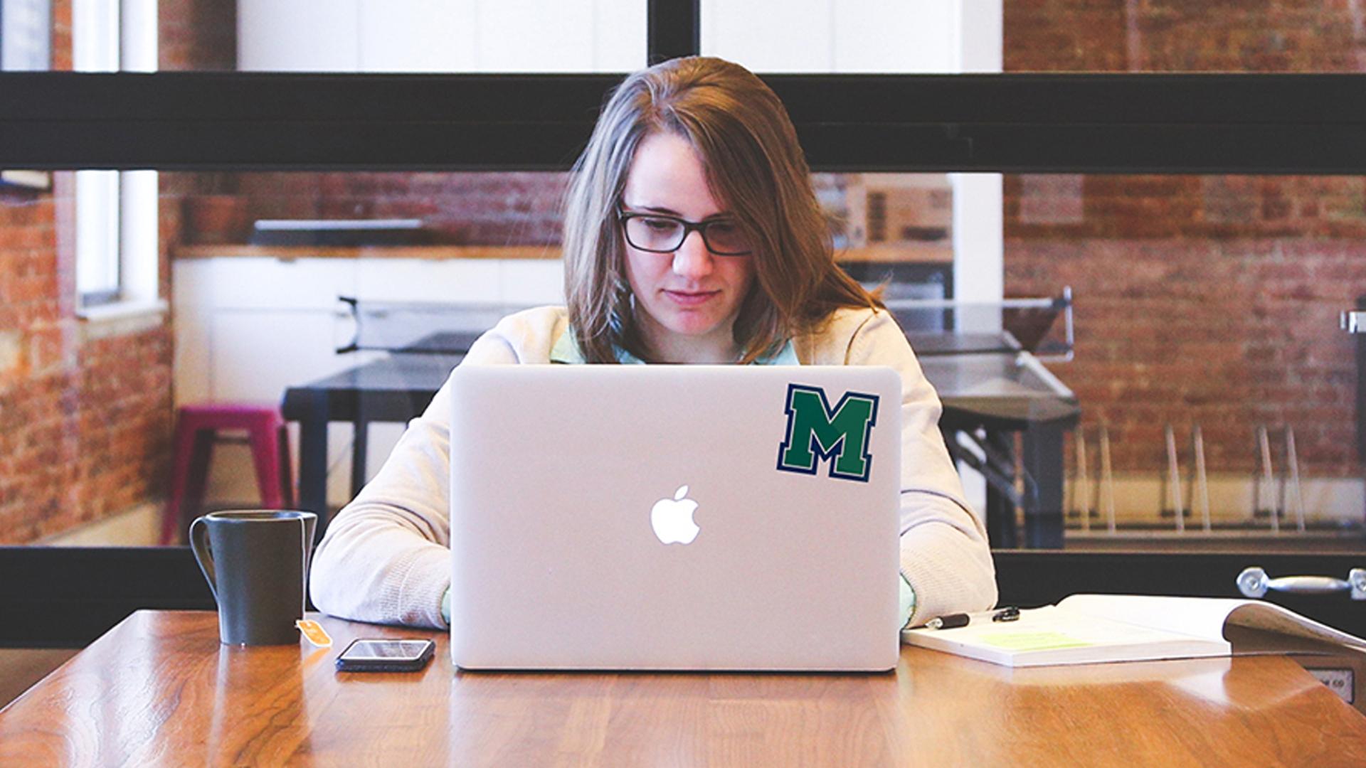 Student using laptop