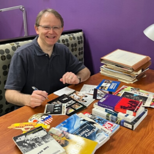 Dr. Jeffrey Roessner with his Beatles materials