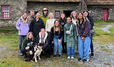 2024 student group photo in Ireland at Famine Houses