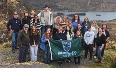 Students Mercyhurst Flag Mountains