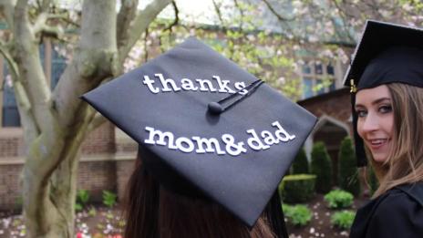 Close-up of graduation cap that reads "Thanks Mom and Dad" at Mercyhurst