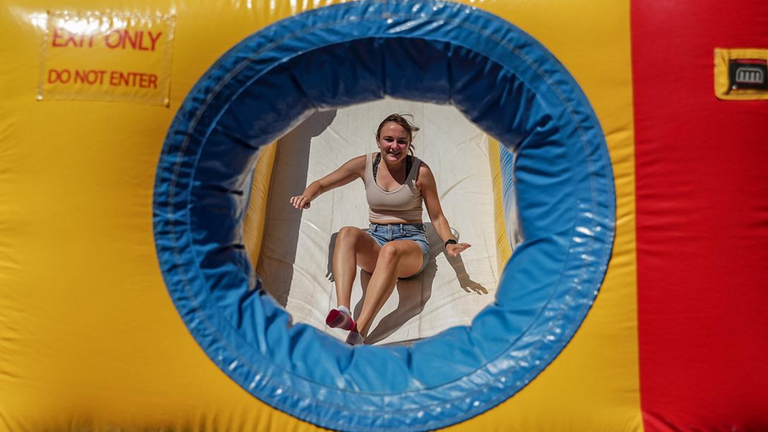 2024 girl on slide during afternoon games