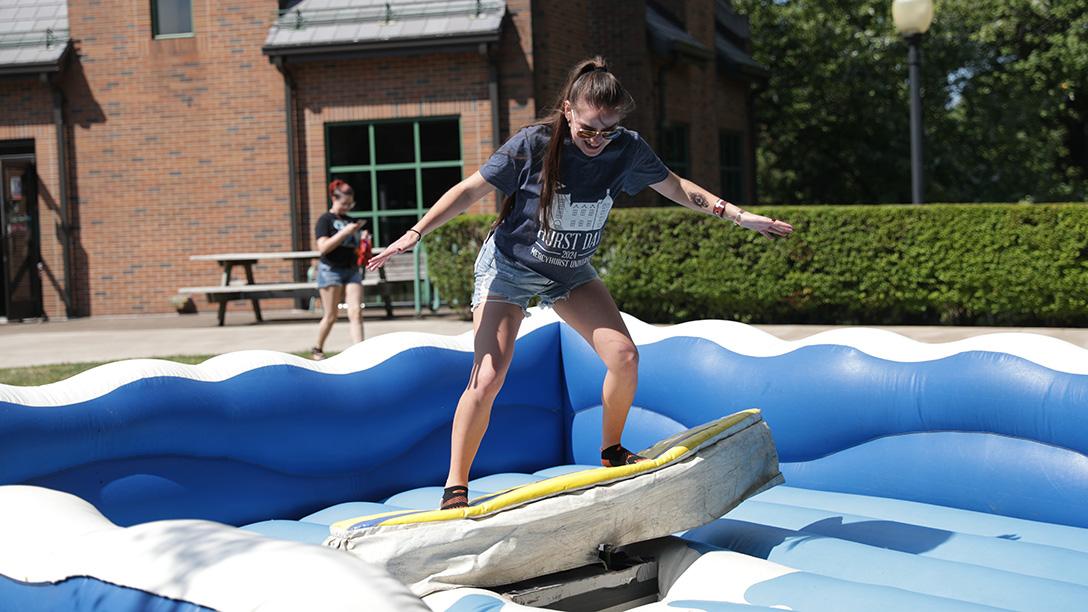 2024 girl on surfboard during afternoon games