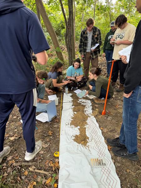 Geology students outside woods