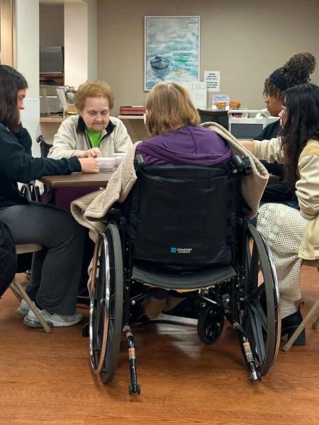 Students visiting residents at Memorial Gardens